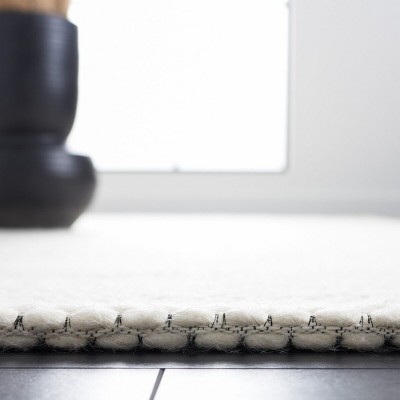 Ivory Braided Hand-Tufted Wool Blend 5' x 8' Area Rug
