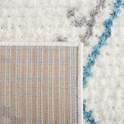 Ivory and Grey Moroccan Style 8' x 10' Synthetic Area Rug