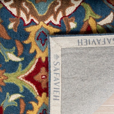 Handmade Blue and Camel Wool Tufted 6' x 9' Area Rug