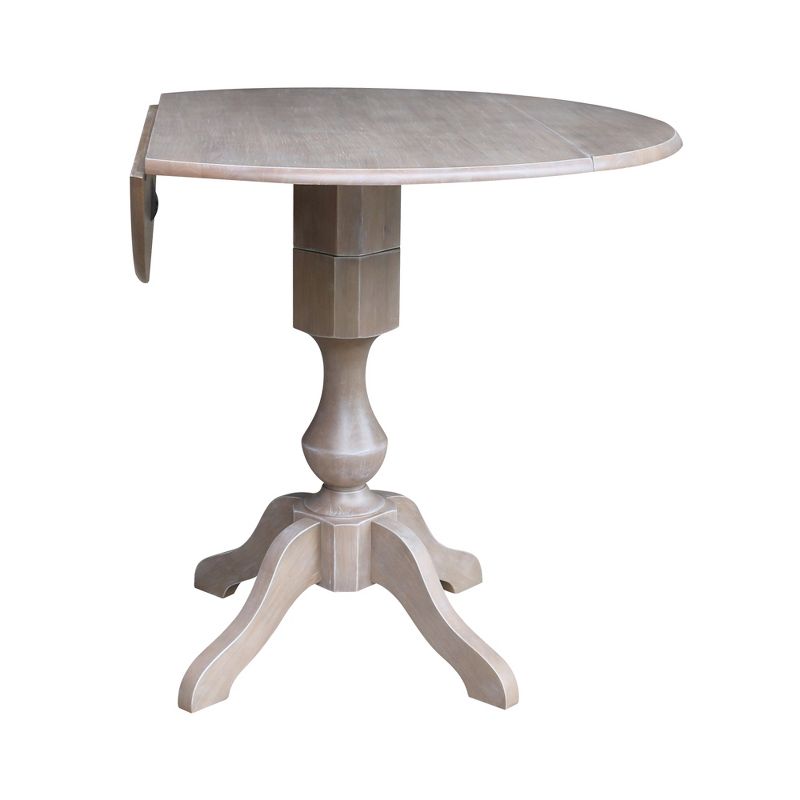 Kayden Round Dual Drop Leaf Pedestal Table Washed Gray Taupe - International Concepts, 4 of 10