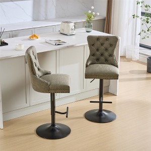Set of two modern upholstered bar height swivel stools with tufted backs and studded accents, height adjustable - 1 of 4