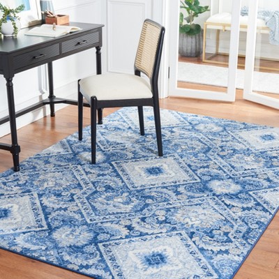 Handmade Round Blue and Ivory Synthetic Area Rug, 4'x6'