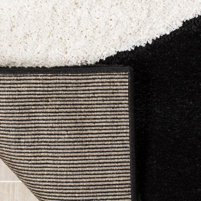 Handmade Tufted Black/Ivory Synthetic Shag Rug, 4x6 Feet