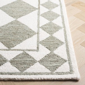 Ebony EBN122 Handmade Tufted Rug - Safavieh - 1 of 4