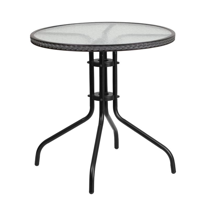Emma and Oliver 28" Round Tempered Glass Metal Table with Rattan Edging, 1 of 3