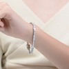 Rhodium Tennis Bracelet with Clear Cubic Zirconia, combining a sleek rhodium finish with dazzling, clear stones for a sophisticated and sparkling look - 2 of 3