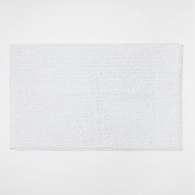 20"x34" Performance Texture Solid Accent Bath Rug White - Threshold™
