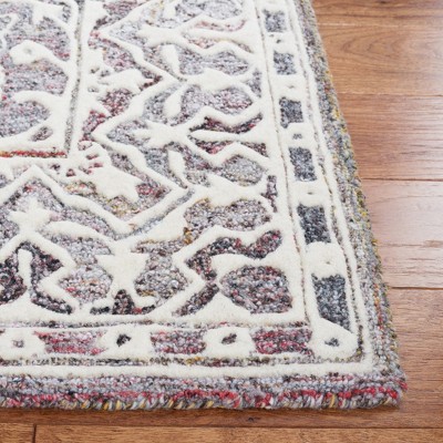 Handmade Red and Ivory Floral Wool Area Rug