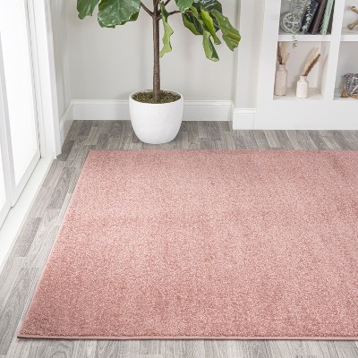 Reversible Solid Pink Synthetic 4' x 6' Easy-Care Area Rug