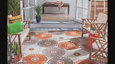 Beige and Blue Floral Synthetic Indoor/Outdoor Area Rug