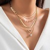 HTUTWOO Gold Layered Necklaces, Boho Rhinestone Heart Pendant Stacked Necklace Set, Personality Snake Bone Chain, Jewelry Gift for Women - 2 of 4