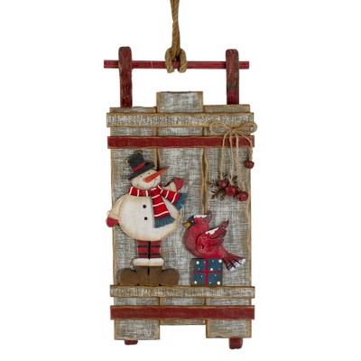 Northlight 15.25" Brown and Red Wooden Snowman Sleigh Christmas Wall Decor