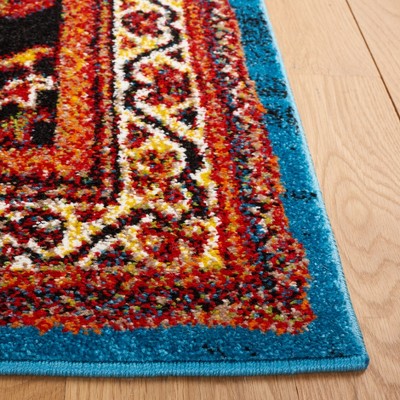 Antique Patina Blue Synthetic Rectangular Area Rug 5'3" x 7'6"