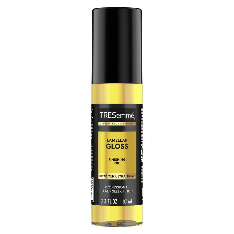 TRESemmé Lamellar Gloss Finishing Oil, 3.3 fl oz. The bottle features a sleek black cap and a gold and black label promising up to 72 hours of ultra shine. The packaging emphasizes professional seal and sleek finish.
