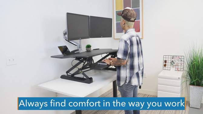 Mount-It! Height Adjustable Standing Desk Converter | 48 Wide Tabletop Sit Stand Desk Riser with Gas Spring | Stand Up Workstation Fits Dual Monitors, 2 of 11, play video