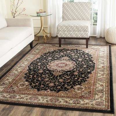 Black and Ivory Floral Tufted 4' x 6' Synthetic Area Rug