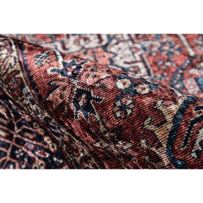 6' x 9' Rust and Blue Synthetic Traditional Area Rug
