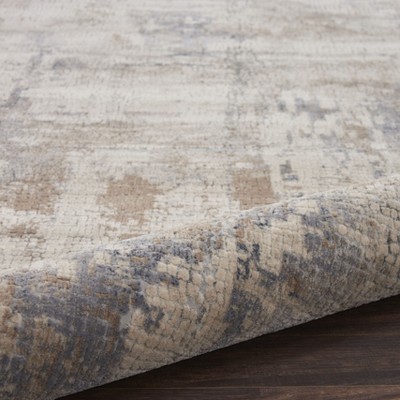 Round Grey and Beige Abstract Synthetic Area Rug