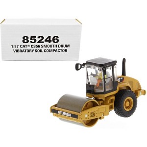 CAT Caterpillar CS56 Smooth Drum Vibratory Soil Compactor with Operator 1/87 (HO) Scale Diecast Model by Diecast Masters - 1 of 4