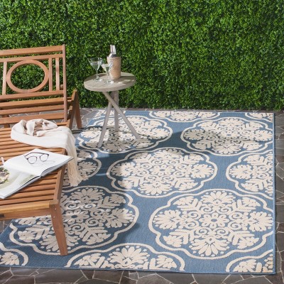 Light Blue and Beige Rectangular Synthetic Medallion Area Rug