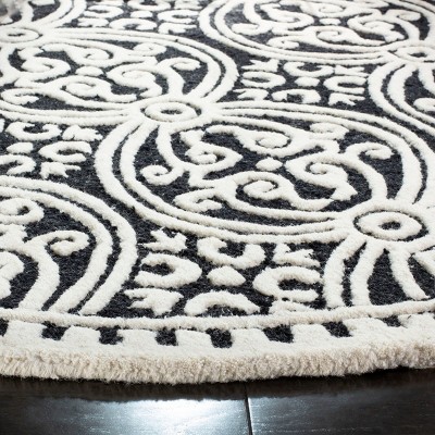 Black and Ivory Round Hand-Tufted Wool Area Rug