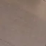 gray cushion/brown wicker