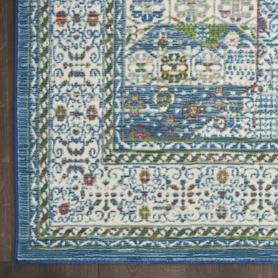 Ivory and Light Blue Synthetic Bohemian Area Rug