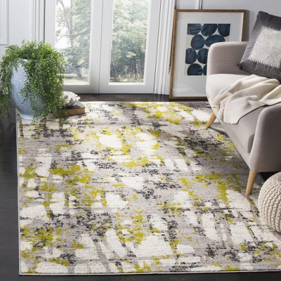 Skyler Grey and Green Abstract Medallion 6' x 9' Synthetic Area Rug