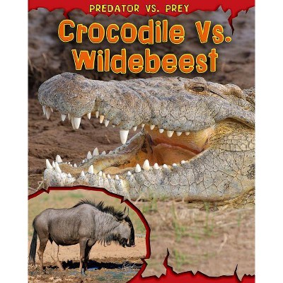 Crocodile vs. Wildebeest - (Predator vs. Prey) by  Mary Meinking (Paperback)