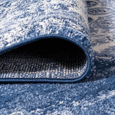 Navy and Ivory Synthetic Medallion 4' x 6' Area Rug