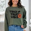 Simply Sage Market Women's Graphic Sweatshirt Trick Or Treat Vibes Pumpkin - image 2 of 4