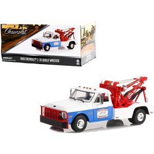 1969 Chevrolet C-30 Dually Wrecker Tow Truck White and Blue "Hazzard County Garage" 1/18 Diecast Model Car by Greenlight - 1 of 4