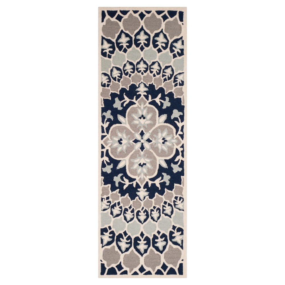 2'3inx7' Runner Navy Blue/Ivory Medallion Tufted - Safavieh