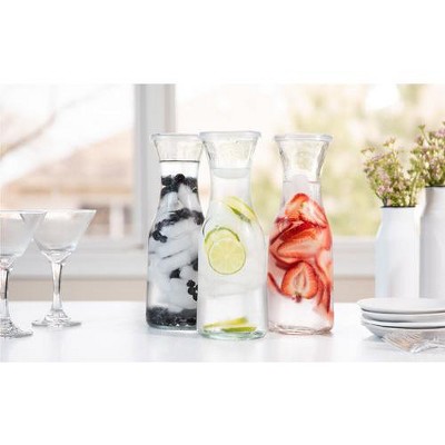 Elegant Glass Carafes with Plastic Lids, Set of 4