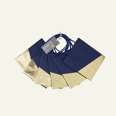 navy and gold bag