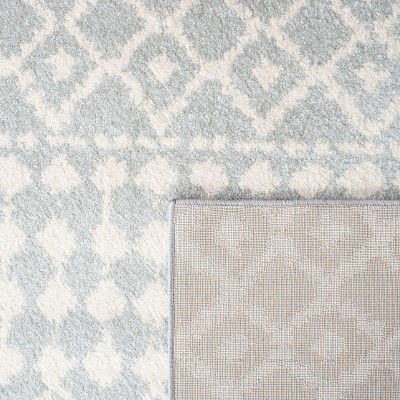 Light Grey and Cream Geometric 4' x 6' Synthetic Area Rug
