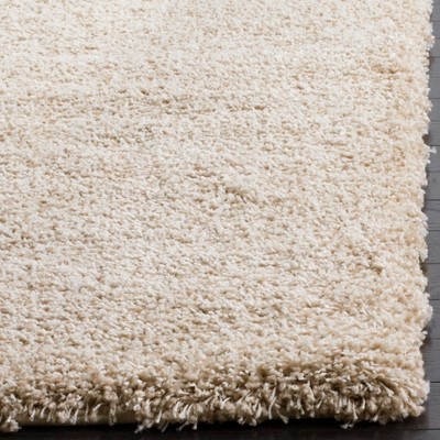 Beige Round Hand-Knotted Shag Synthetic Area Rug