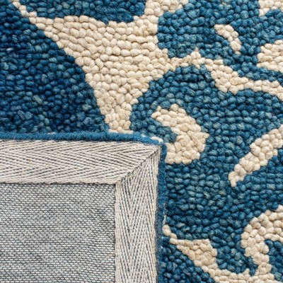 Handmade Blue and Ivory Wool Tufted Area Rug 4' x 6'
