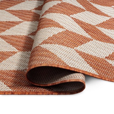 Orange and Ivory Geometric 8' x 10' Synthetic Area Rug
