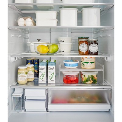 White Expandable Plastic Refrigerator Riser Shelf
