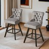 Leovsnove Velvet Swivel Bar Stool Set of 2,Counter Height Upholstered Rotating Barstools with Wood Legs,Footrest,Chrome Nailhead - 2 of 4