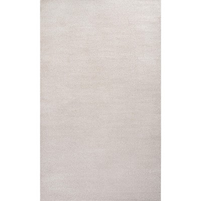 Ivory Low-Pile Synthetic Reversible Area Rug, 8 x 10