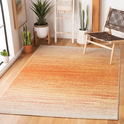 Adirondack Orange and Red Synthetic Rectangular Area Rug