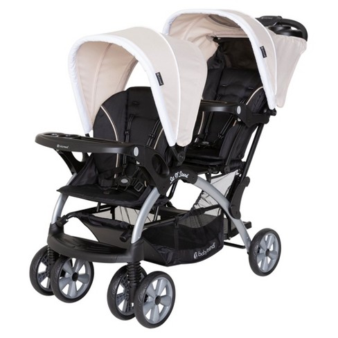 Double stroller with outlet sit and stand option