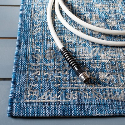 Riviera Easy-Care Blue and Grey Synthetic 9' x 12' Outdoor Rug