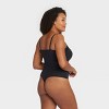 ASSETS by SPANX Women's Lace Trim Thong Bodysuit - Black - 4 of 4