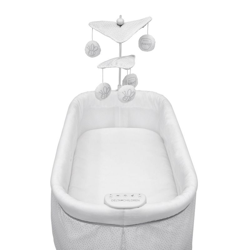 Delta Children Disney Winnie the Pooh Bassinet with Stationary Mobile Arm, Vibration, Nightlight and Music - White/Gray, 4 of 11