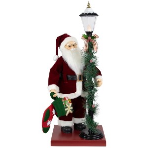 Northlight Animated and Musical Santa Claus Figure with Lighted Lamppost and Christmas Stocking - 31" - 1 of 4