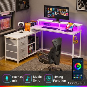 Greenstell L-shaped computer desk - with LED lights, charging socket, and fabric drawer for storage - 1 of 4