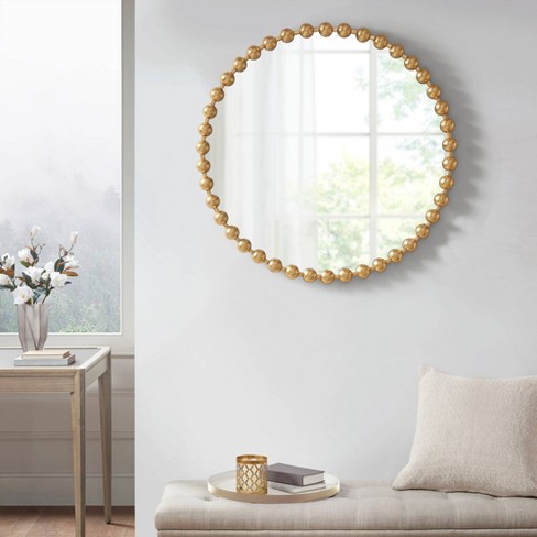 Round mirror store wall